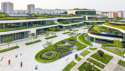 A modern urban development featuring green roofs,