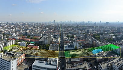 A panoramic view of an urban landscape with highli