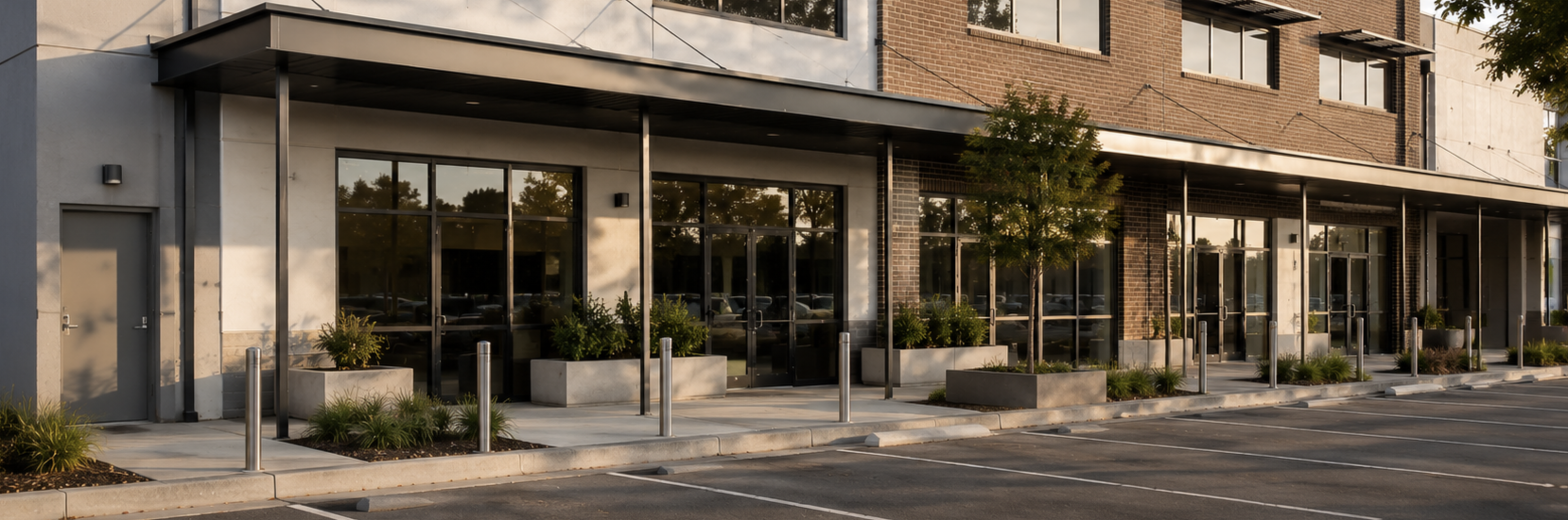 Modern Australian commercial office building with controlled glazing, external shading and restrained landscaping