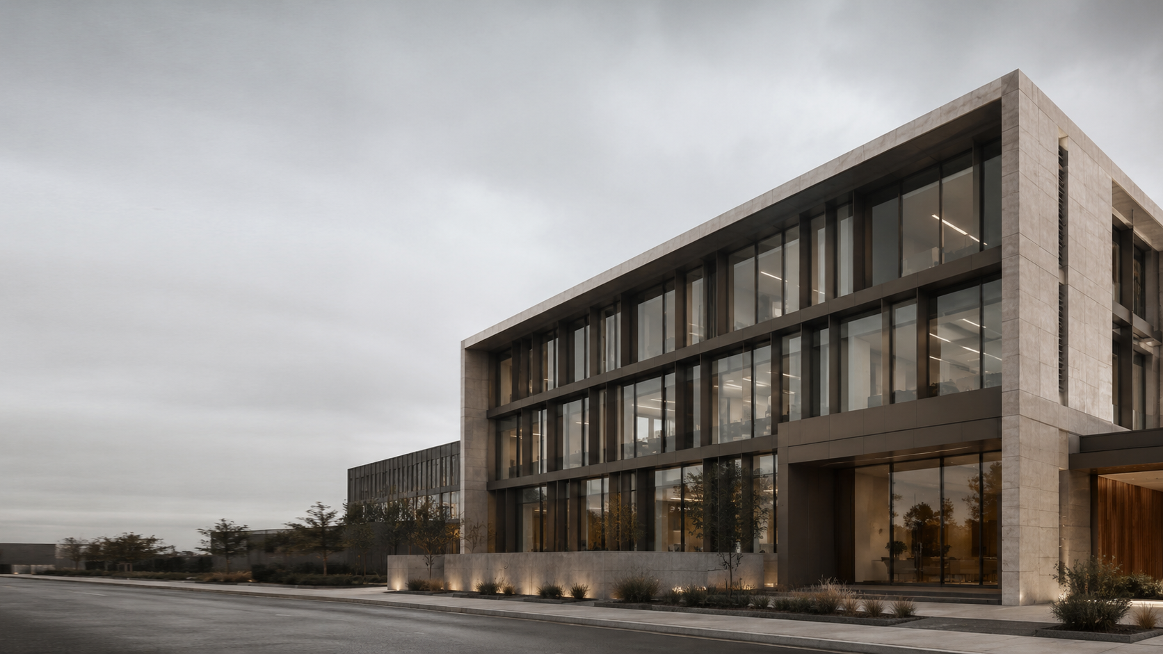 Contemporary Australian commercial building with shaded glazing and refined façade design, representing Section J and JV3 energy performance compliance.